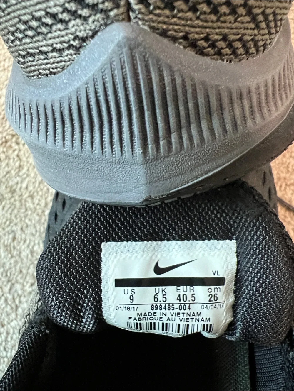 Nike Women’s Black and Gray Mesh Running Sneakers